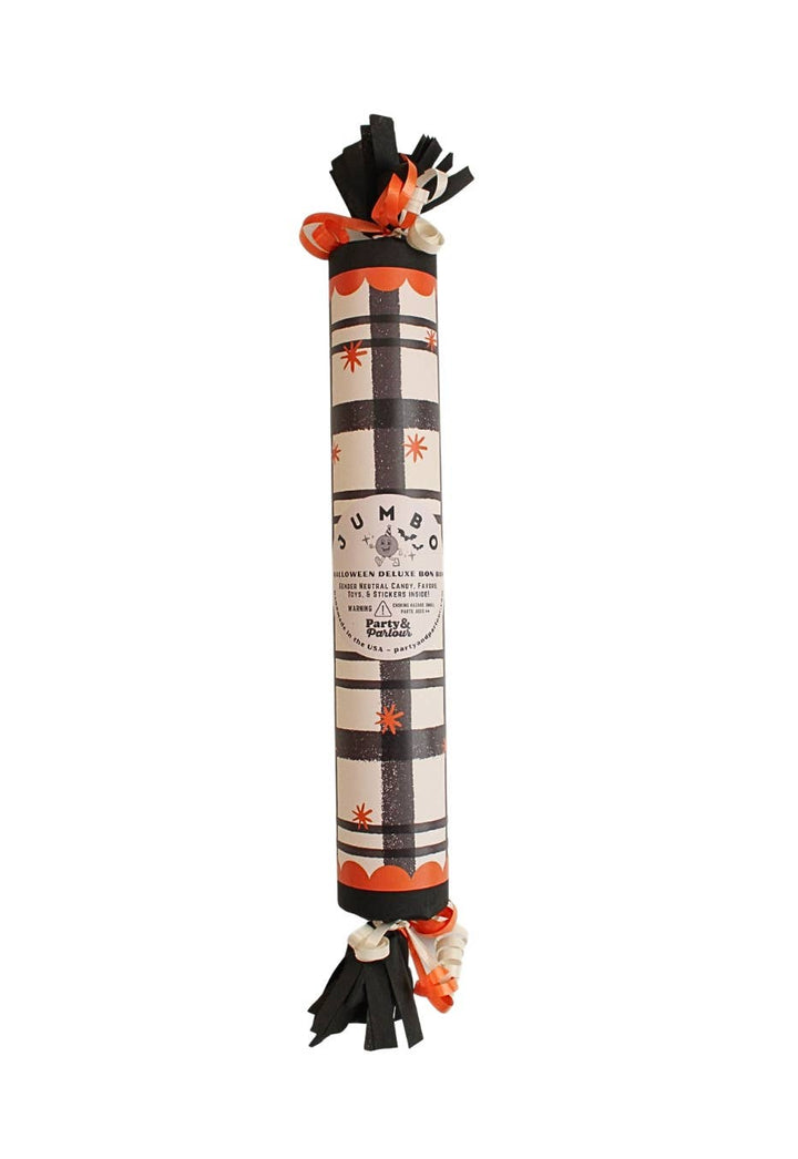 Black plaid jumbo Halloween surprise bon bon cracker with orange trim and black fringe for a Halloween dinner table