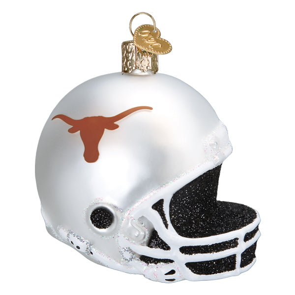 White Texas Longhorns football helmet glass ornament with burnt orange Longhorn logo and white face mask, on white