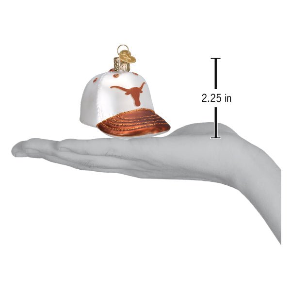 Texas baseball cap ornament on an open hand with a 2.25 inch height marker for scale