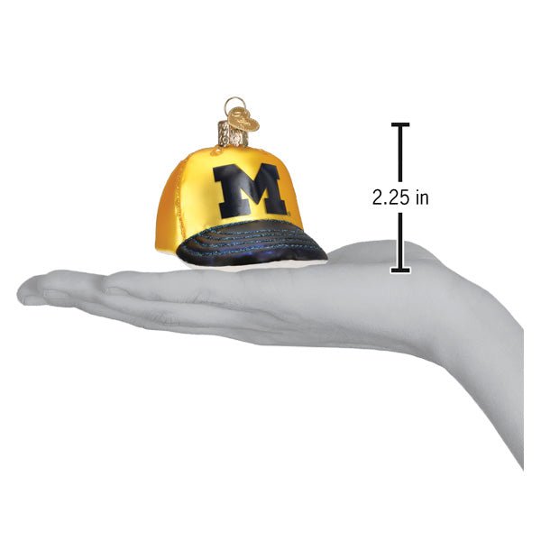 Michigan baseball cap ornament on an open hand with a 2.25 inch height marker for scale