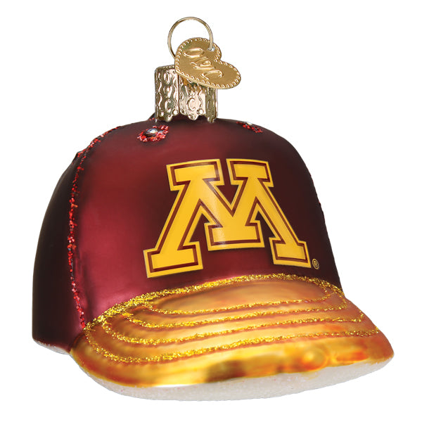 University of Minnesota baseball cap ornament, maroon crown with a gold M and glittered gold brim, front view on white