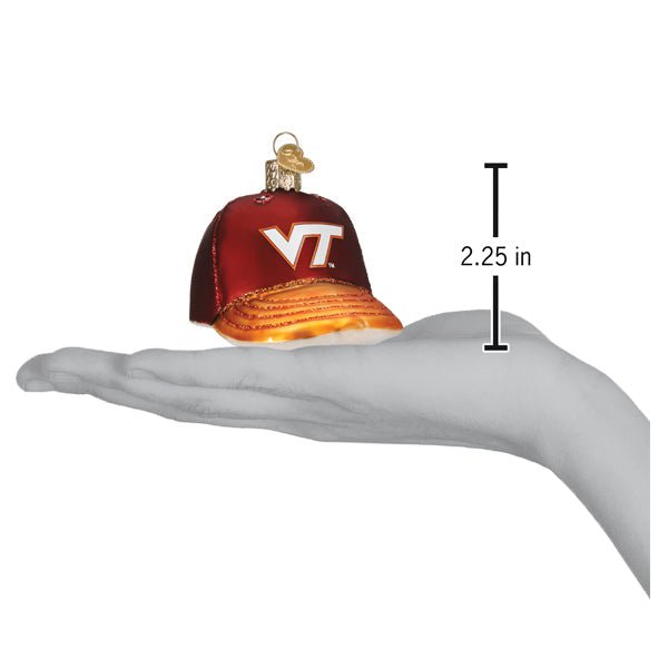 Virginia Tech cap ornament on an open palm beside a 2.25 inch height marker