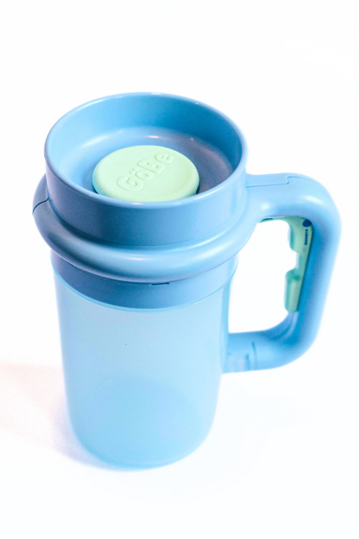 Blue Wonder Cup with the lid off, showing the silicone valve inside