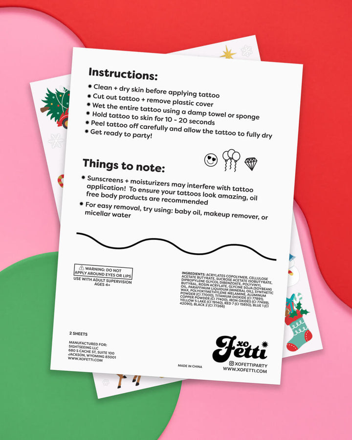 Back of the Christmas temporary tattoo sheet with application instructions and an ages 4 and up warning