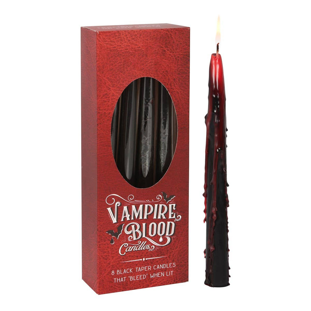 Vampire Blood red box with a lit black taper bleeding red wax, dramatic candles for a Halloween party