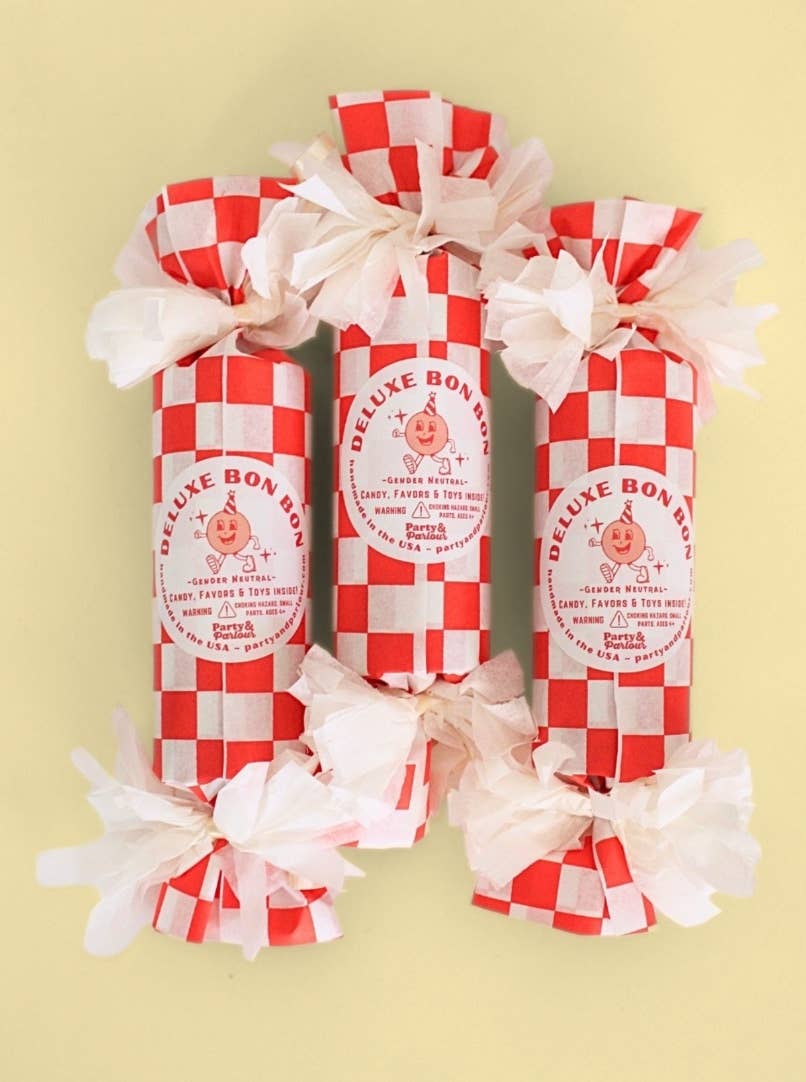 Red and white check bon bon trio on a yellow background, styled for carnival birthday themes