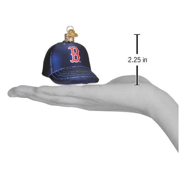 Red Sox baseball cap ornament resting on an open palm beside a 2.25 inch height marker