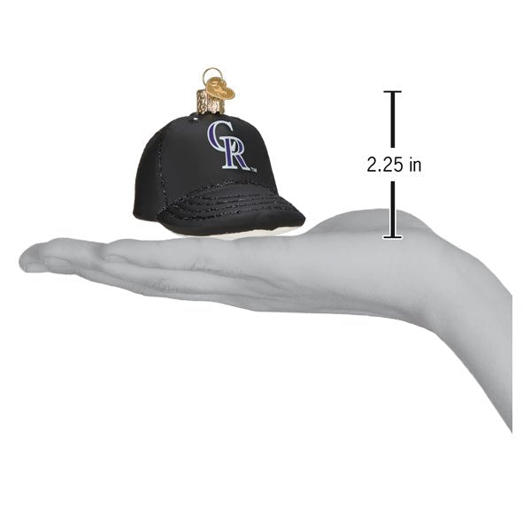 Rockies baseball cap ornament resting on an open palm beside a 2.25 inch height marker