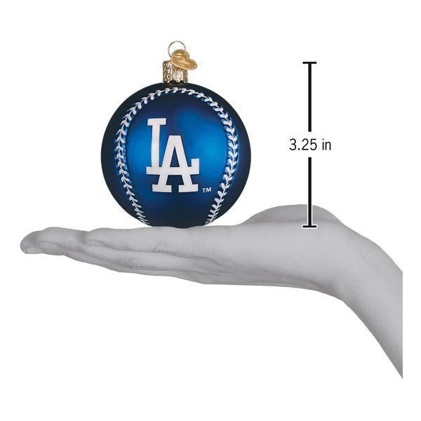 Dodgers baseball ornament resting on an open palm beside a 3.25 inch height marker