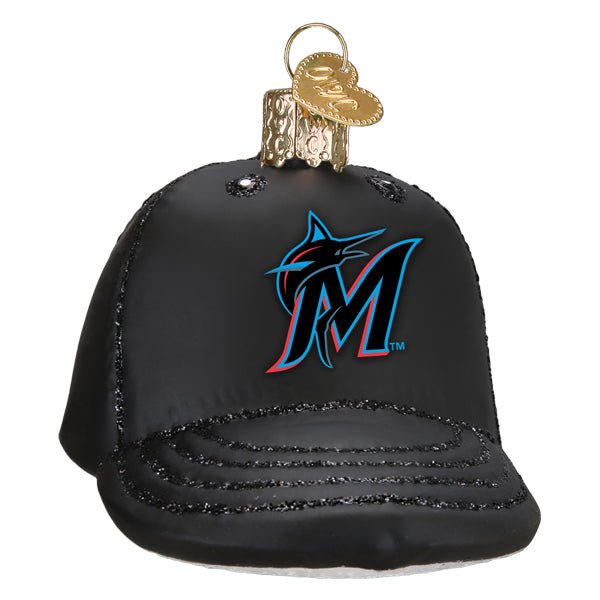 Front of the Miami Marlins baseball cap ornament, a black glass cap with the marlin M logo and glittered brim, on white
