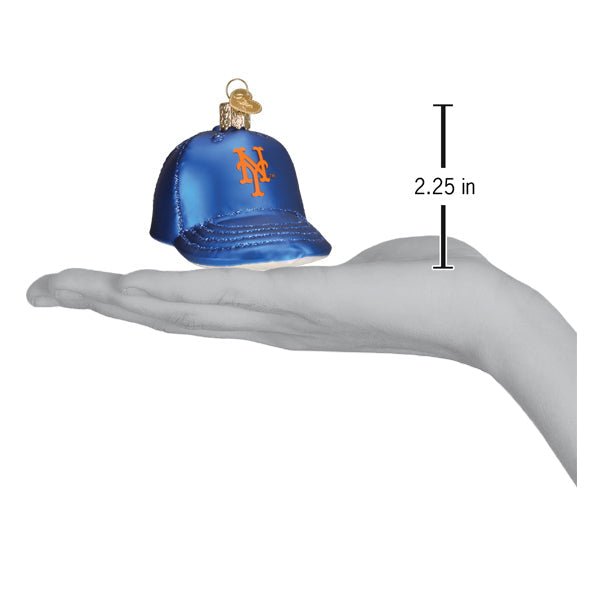 Mets baseball cap ornament resting on an open palm beside a 2.25 inch height marker
