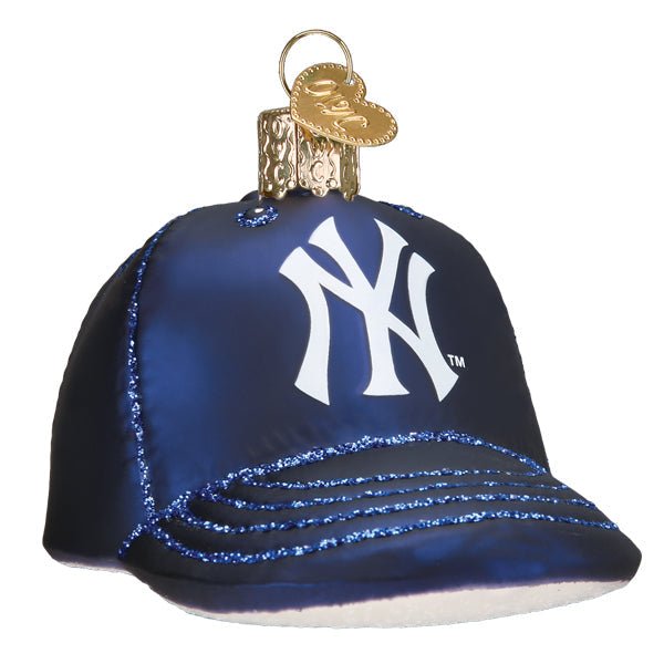 New York Yankees baseball cap ornament, navy with the white NY logo, glittered brim, front view on white