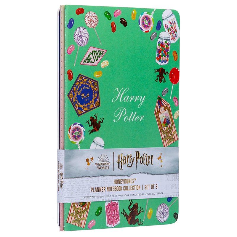 Harry Potter Honeydukes planner notebook by Insight Editions shown open to a dotted page with candy illustrations, set of three