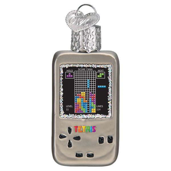 Mini Tetris handheld game ornament, front view with colorful falling blocks on a glittered screen, on white