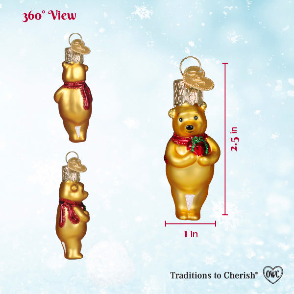 Mini Winnie the Pooh glass ornament holding a gift for a Christmas tree