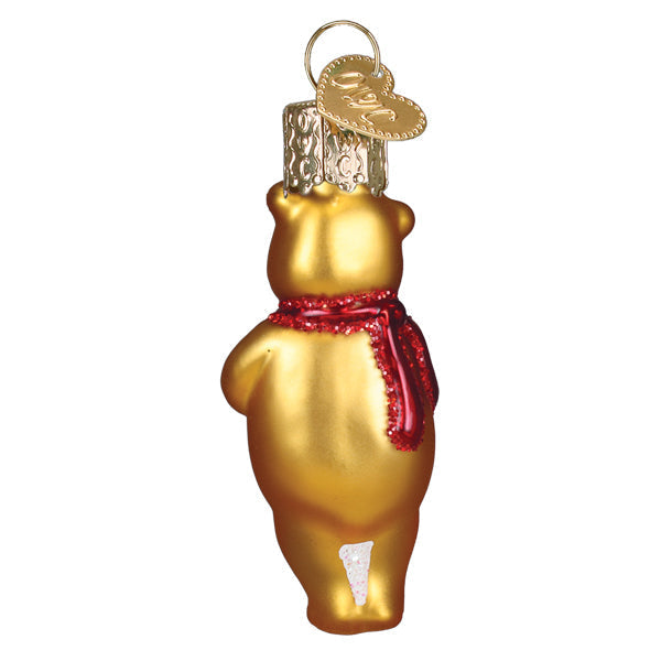 Mini Winnie the Pooh glass ornament holding a gift for a Christmas tree