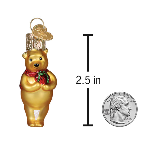 Mini Winnie the Pooh glass ornament holding a gift for a Christmas tree