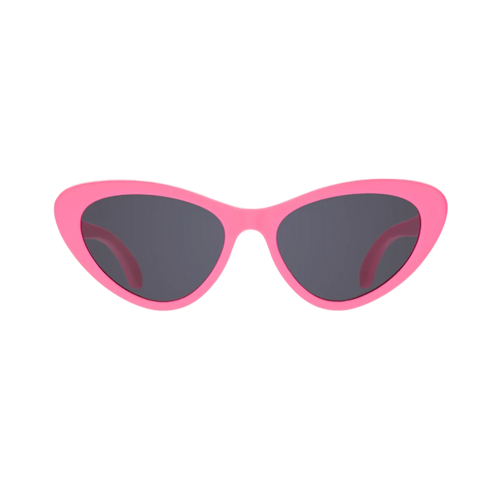 Pink cat-eye kids sunglasses shown from the front with smoke lenses on a plain background.
