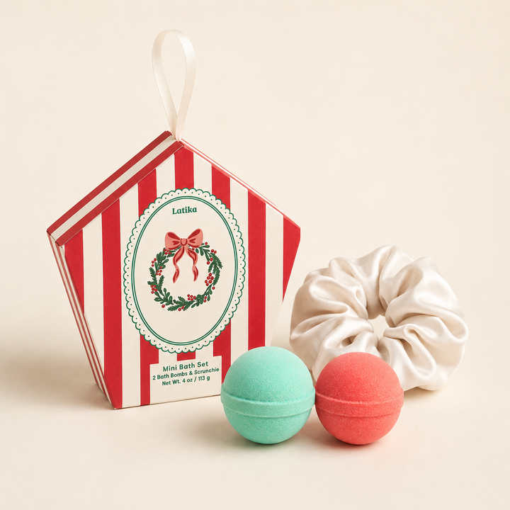 Wreath ornament box with aqua and coral mini bath bombs and scrunchie on cream, a Christmas stocking stuffer