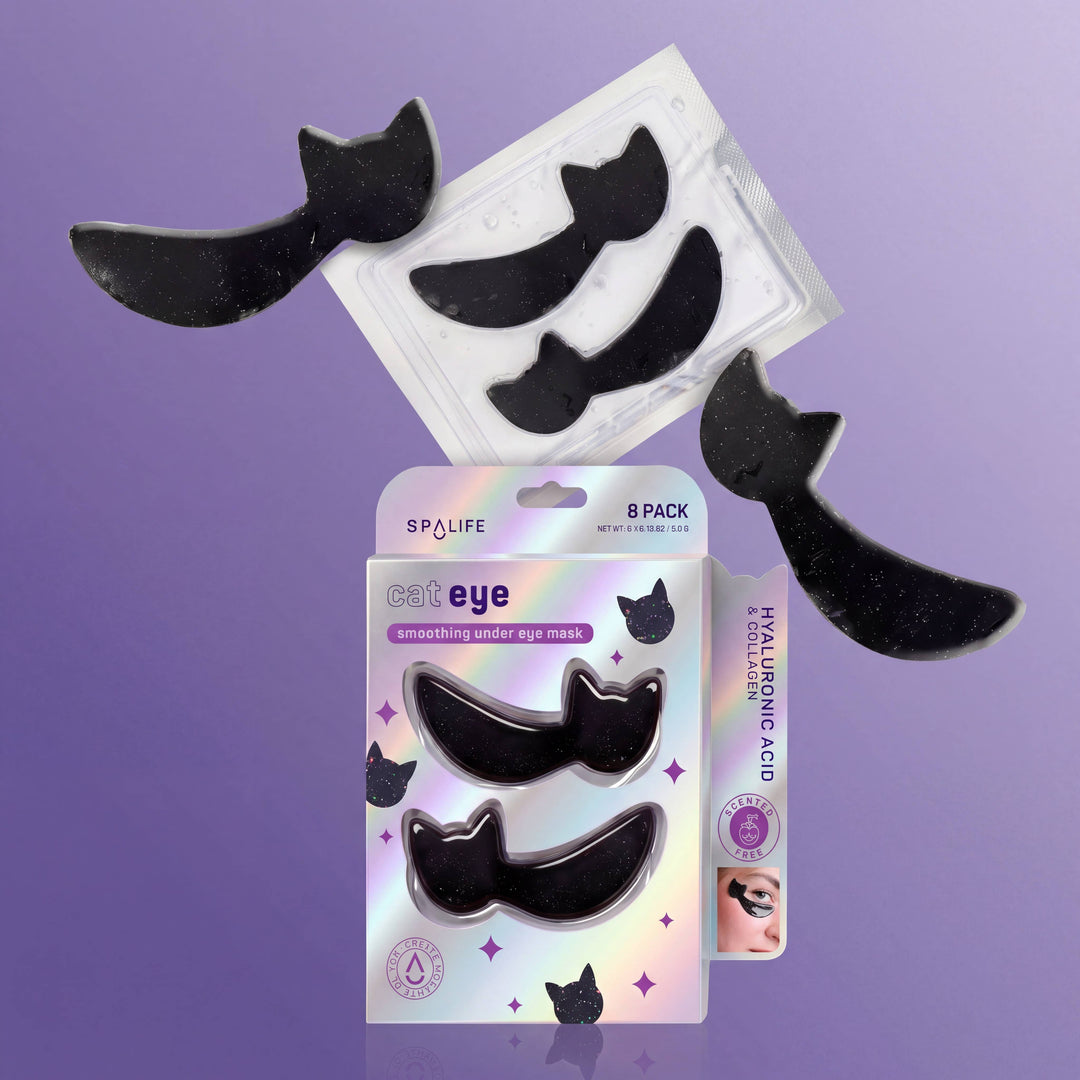 Black cat shaped under eye patches floating around the Cat Eye eight pack box with hyaluronic acid for Halloween glam