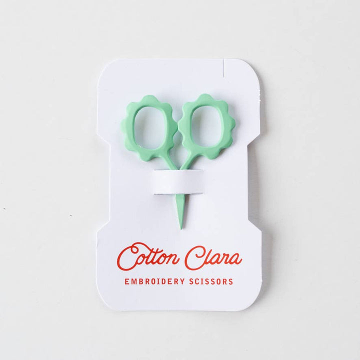 Mint mini flower embroidery scissors on a reusable thread card bobbin