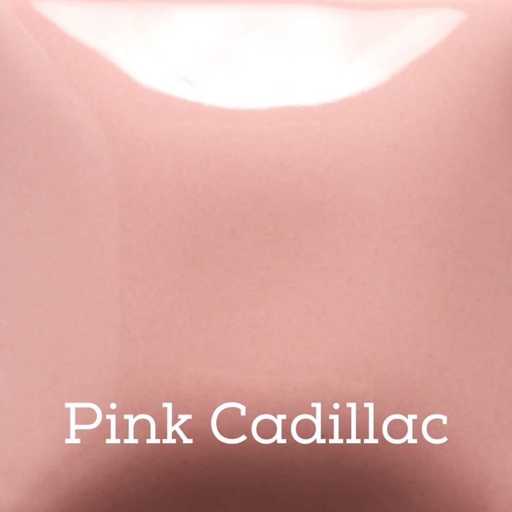 Close-up of pink Cadillac car body with 'Pink Cadillac' text overlay.