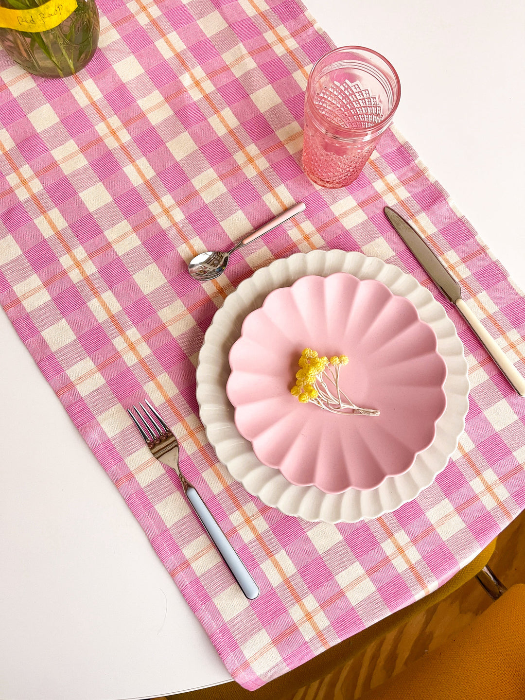 Pink bubblegum plaid table runner styled with coordinating place settings
