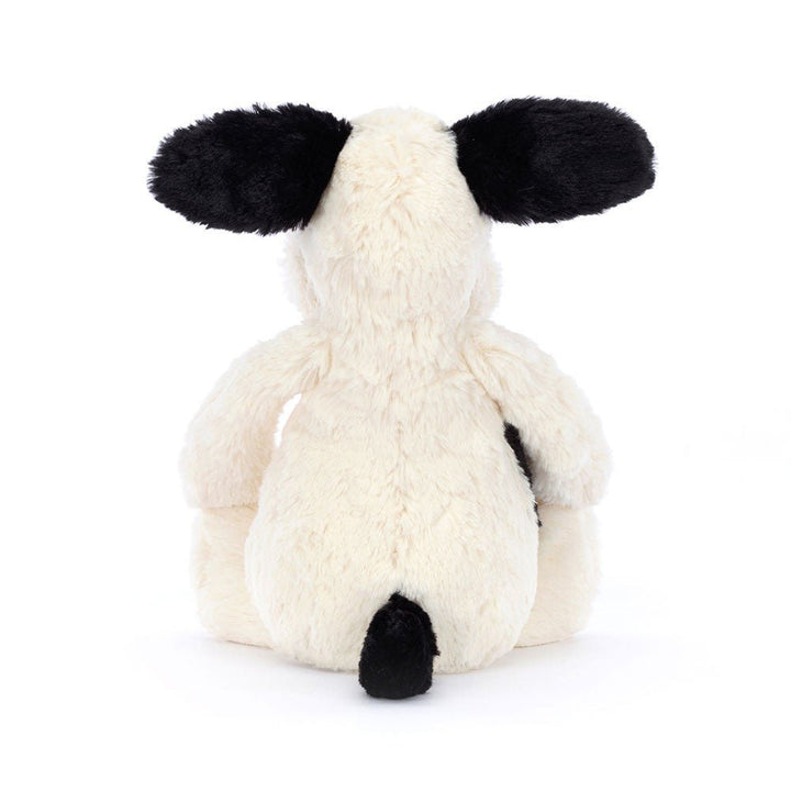 Jellycat Bashful Black and Cream Puppy plush, a cuddly stuffed animal gift for a birthday or baby shower.