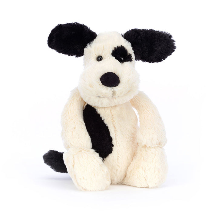 Jellycat Bashful Black and Cream Puppy plush, a cuddly stuffed animal gift for a birthday or baby shower.