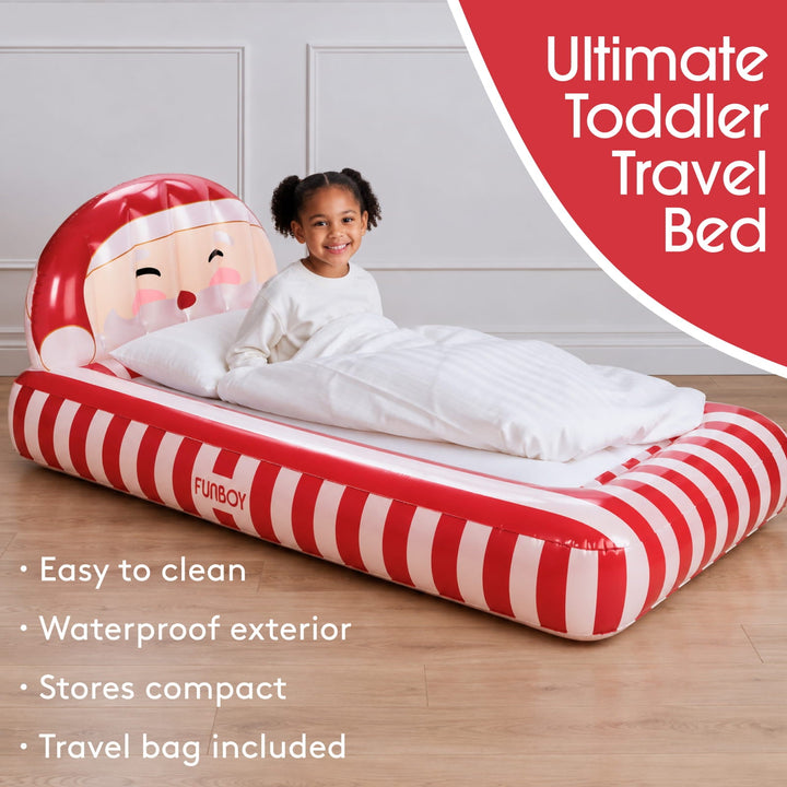 Child sitting on a Santa air mattress with travel bed features listed