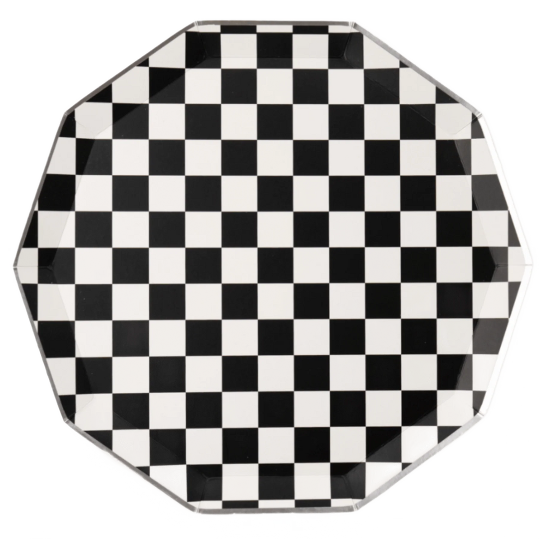 Black and white checker large dinner plates, set of 8, stacked for a Halloween party table