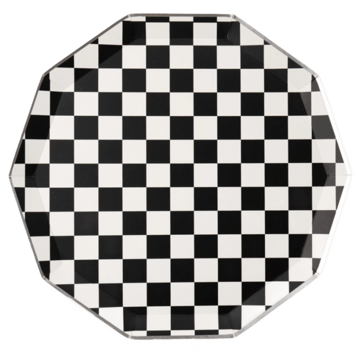 Black and white checker large dinner plates, set of 8, stacked for a Halloween party table
