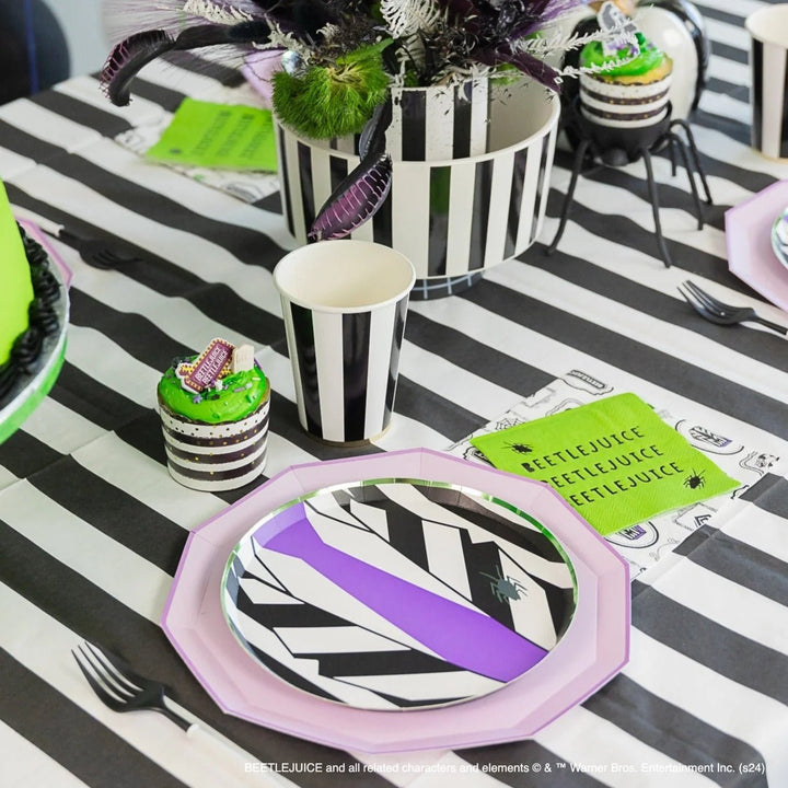 Beetlejuice party supplies set out for a Beetlejuice-inspired Halloween party.