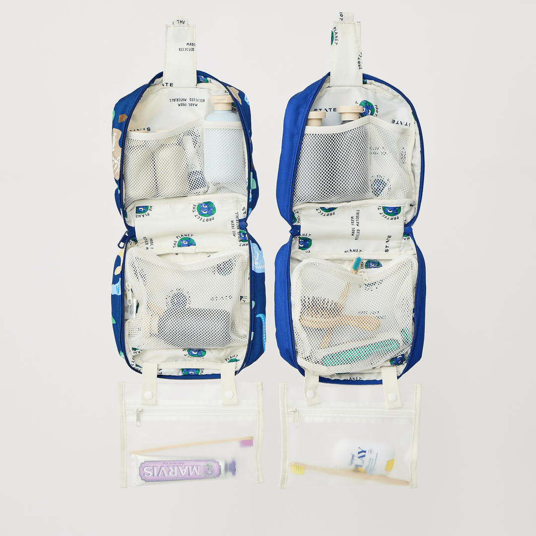 Two opened Bensen toiletry bags in other prints packed with toiletries to show storage