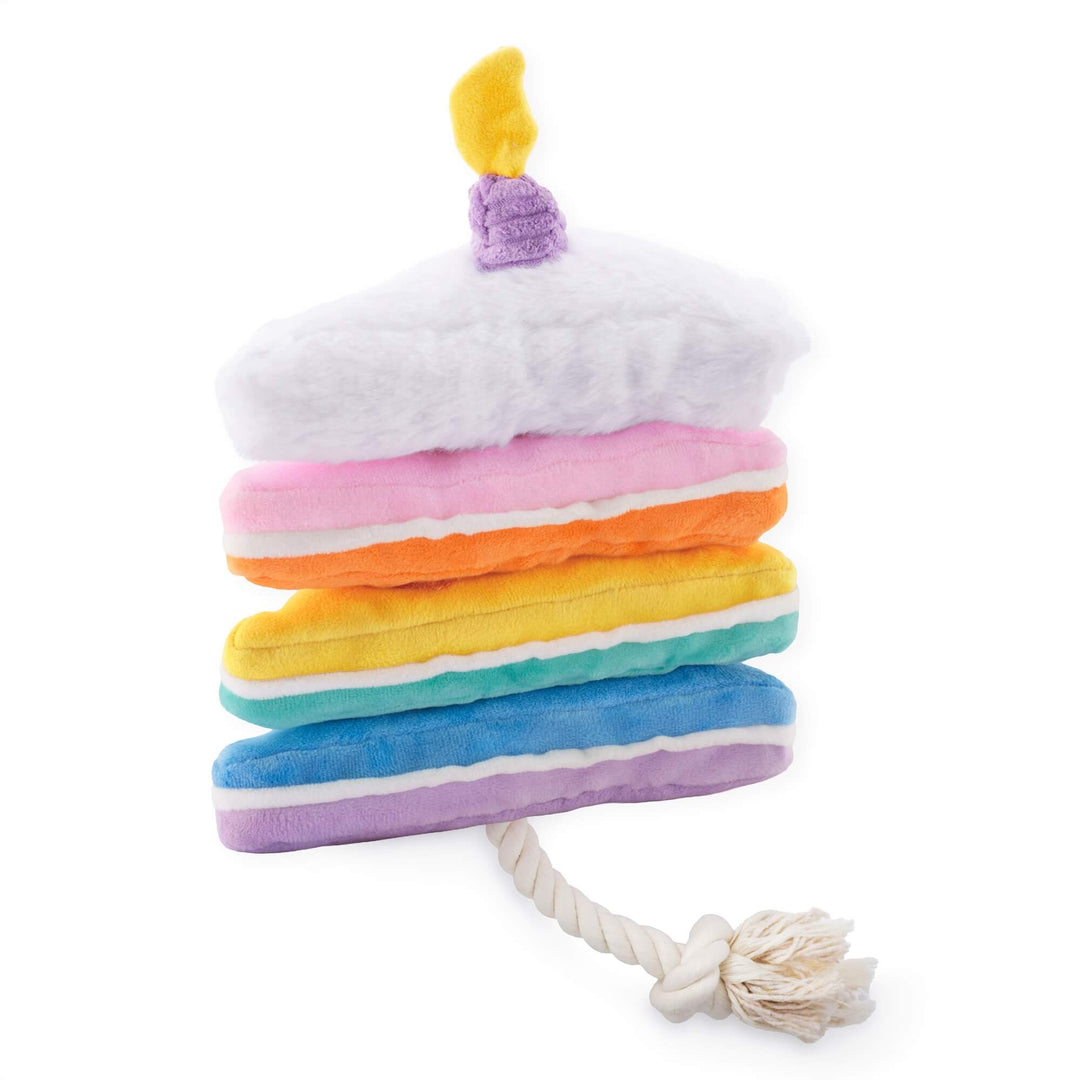 Birthday cake snuffle dog toy shaped like a slice of cake, side view