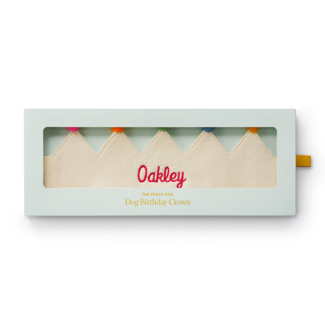 Ivory crown embroidered Oakley inside its windowed mint keepsake box
