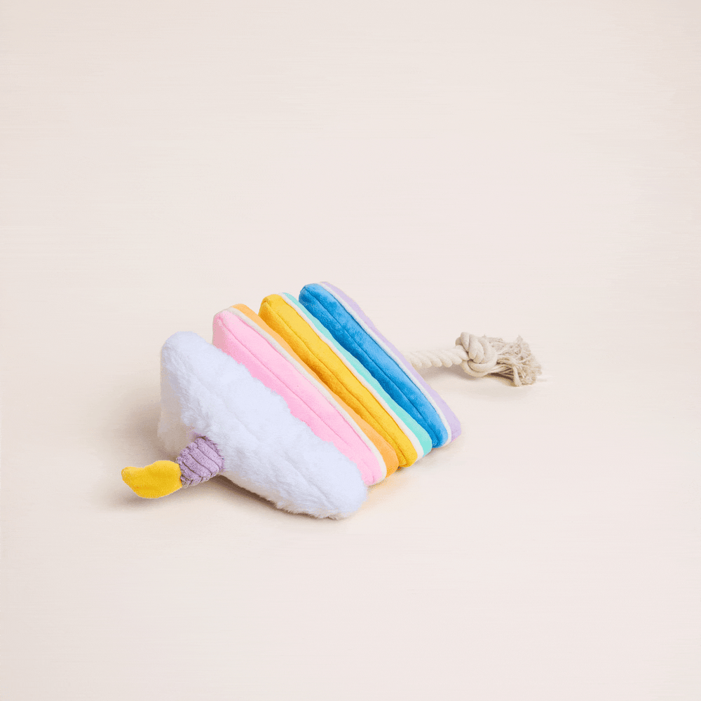 Animation showing the birthday cake snuffle toy's hidden pockets