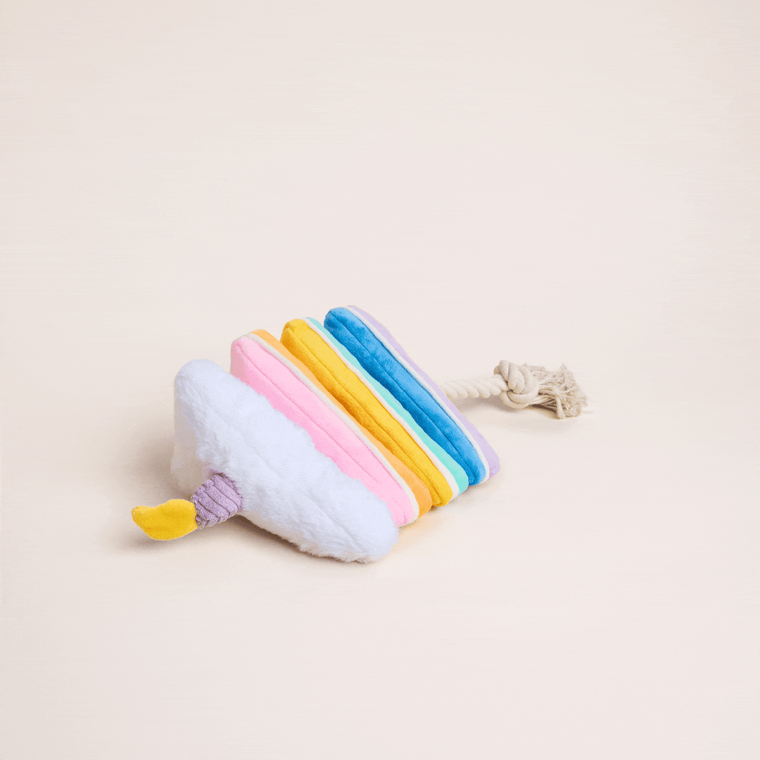 Animation showing the birthday cake snuffle toy's hidden pockets