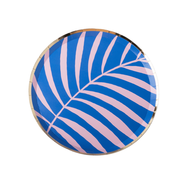 round paper plates featuring a blue and pink palm leaf pattern with a metallic gold rim, photographed on a clean white background.