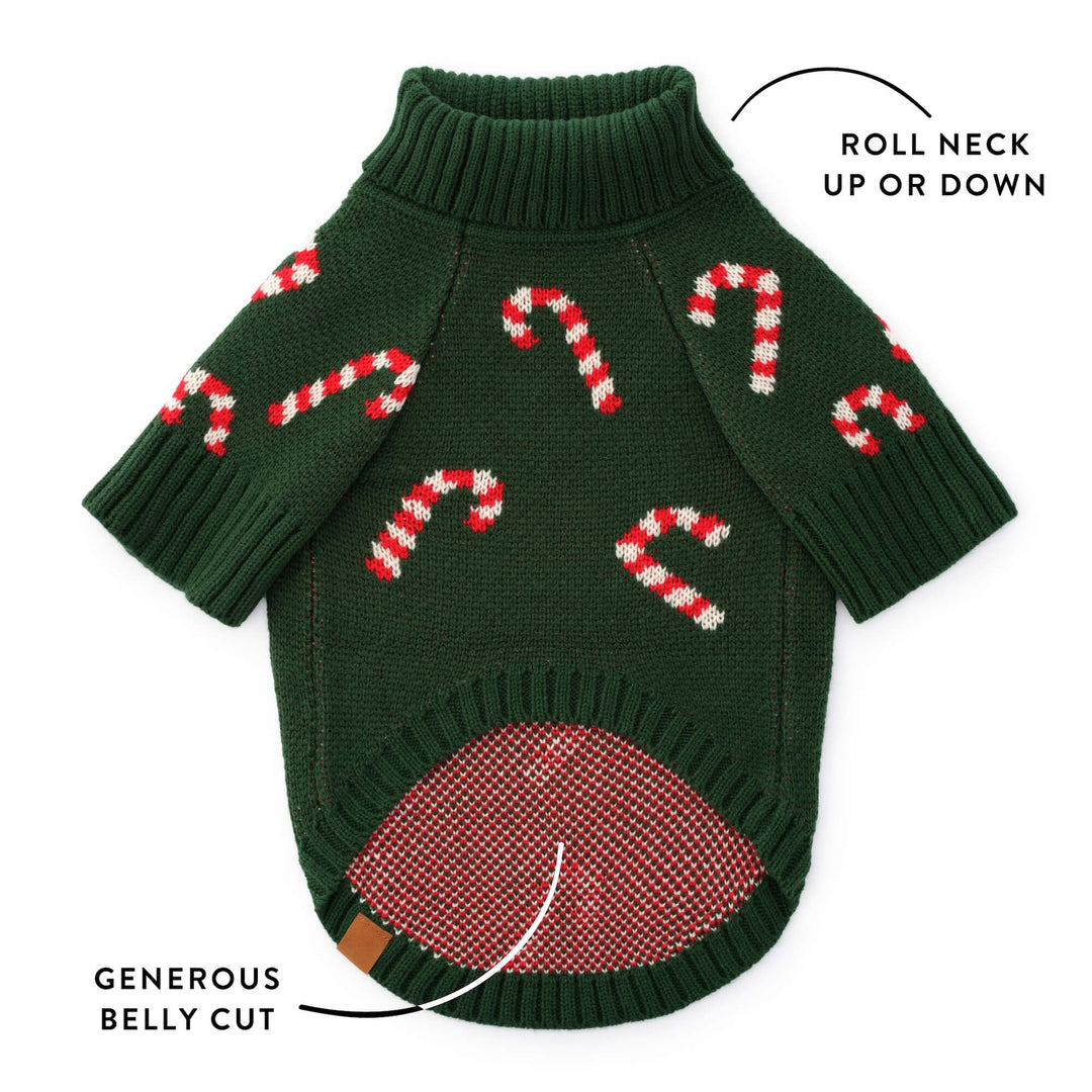 Callout of the evergreen candy cane sweater showing the roll neck and generous belly cut