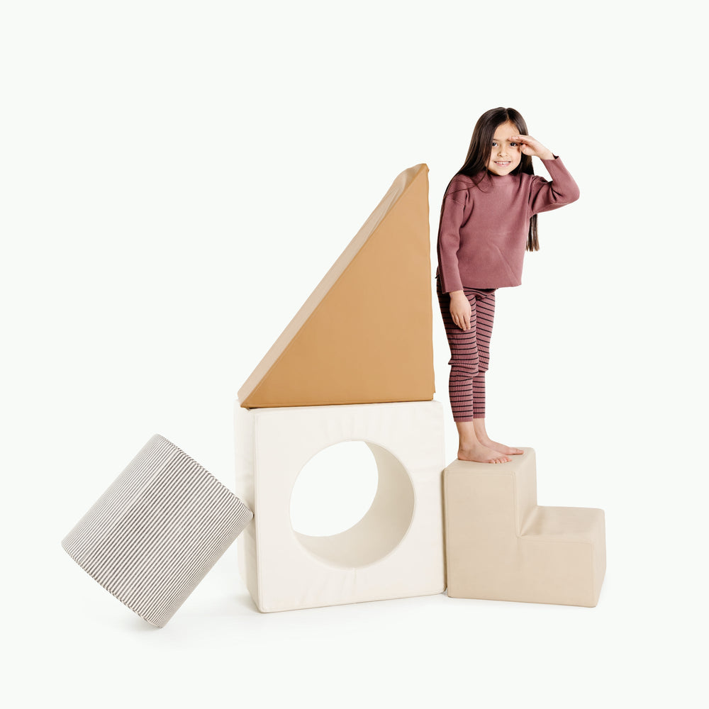 Gathre block playset with foam steps, a cube, and a triangle ramp in cream London print and rust
