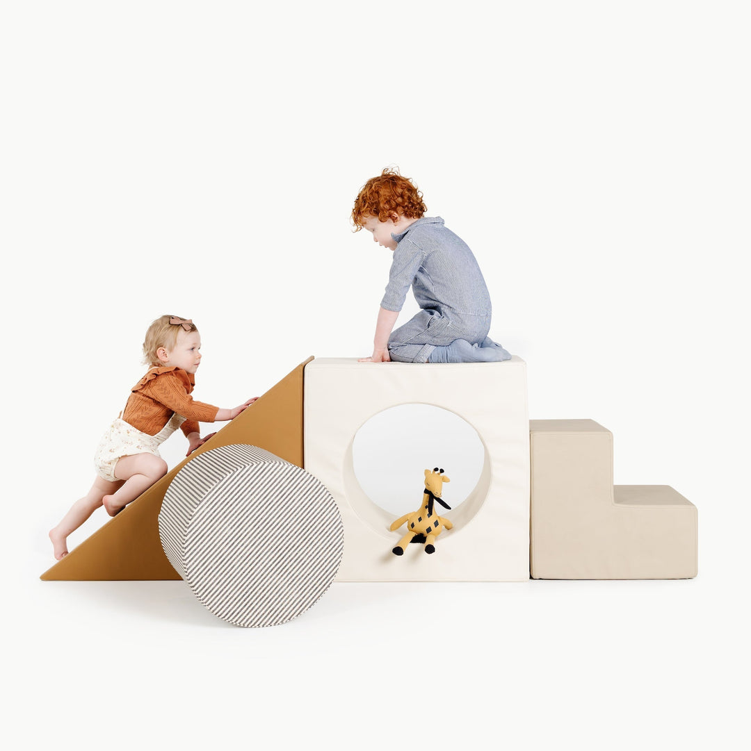 Gathre block playset with foam steps, a cube, and a triangle ramp in cream London print and rust