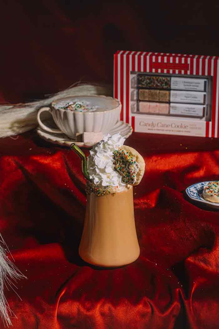 Candy cane cookie latte with a festive sprinkle rim