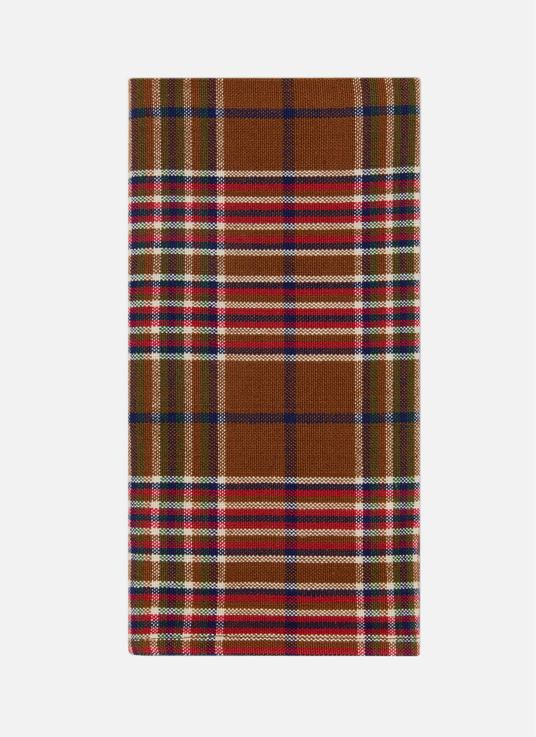 Charlotte plaid cloth napkin in nutmeg, red, indigo, and olive folded to show the weave