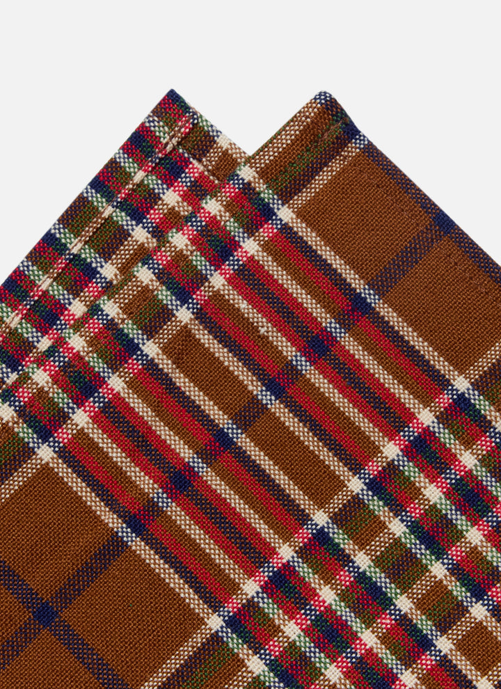 Close-up of the Charlotte plaid weave showing red and indigo over a nutmeg cotton ground