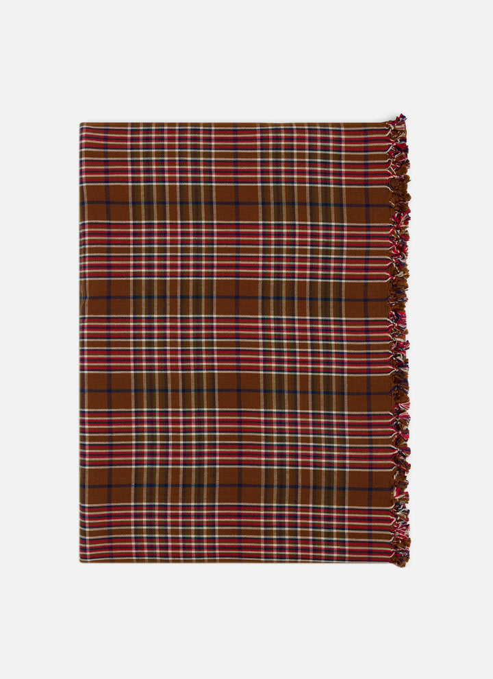Charlotte plaid holiday tablecloth folded flat with tassels along the edge