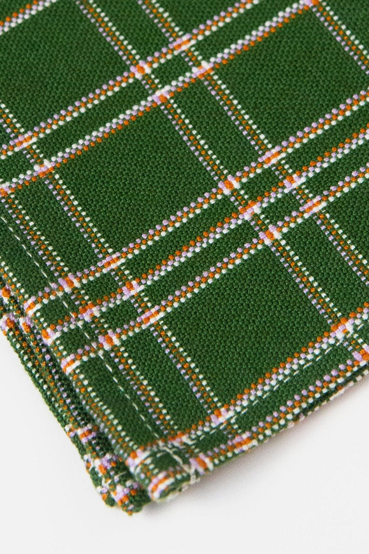 Detail of forest green plaid weave with lilac accent