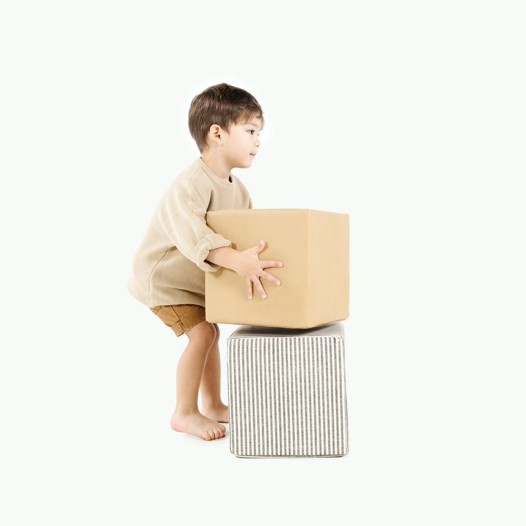 Gathre foam play cubes in stone stripe vegan leather for indoor play.