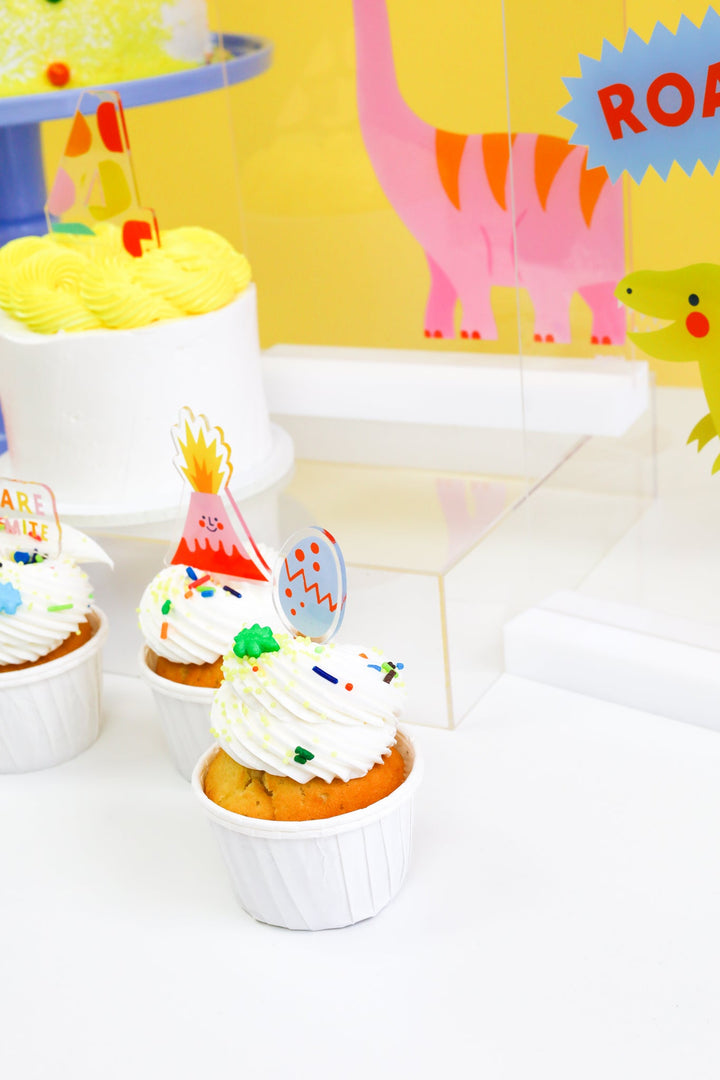 Acrylic dinosaur cupcake toppers in the Dino-mite design from Joyeux Company