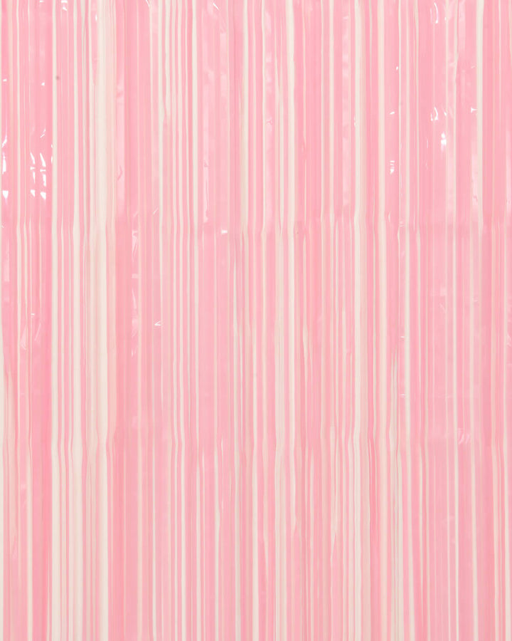 Close-up of matte pink foil fringe strands showing the soft non-glare finish